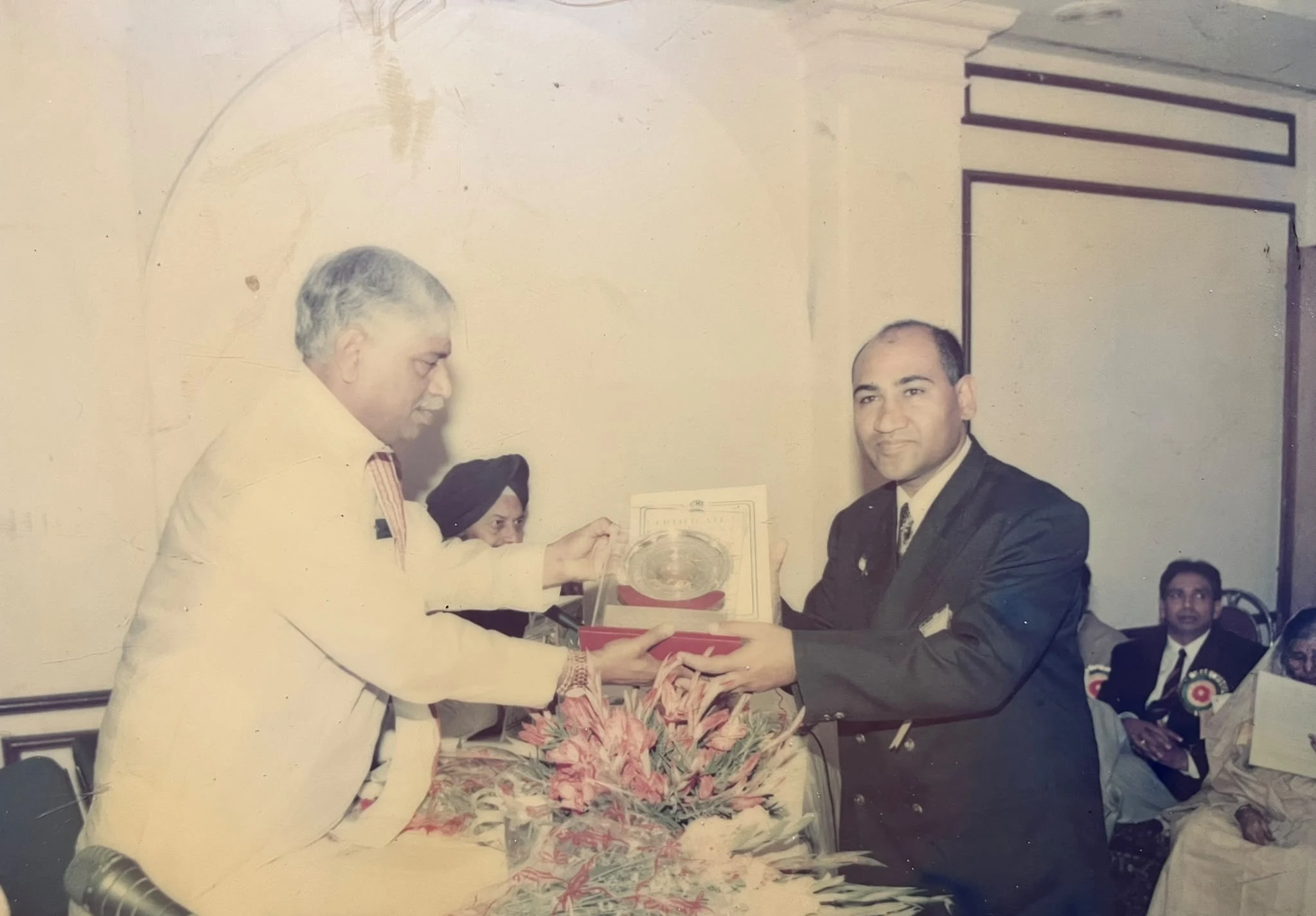 Felicitation moment during a formal community program