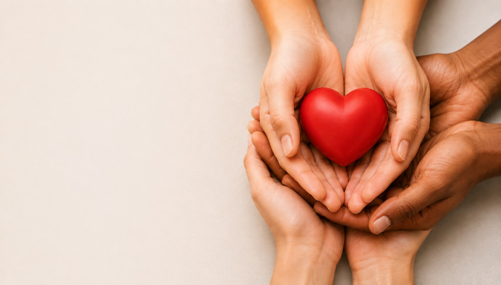 Hands holding a red heart