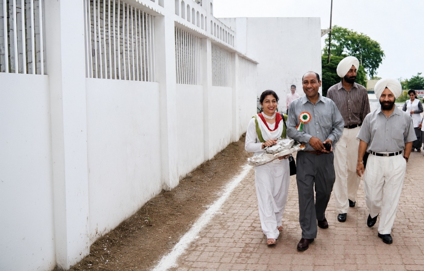 S.B. Native Welfare Society members walking together during a community welfare visit